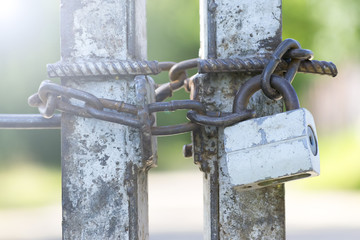 Metal lock on an iron gate