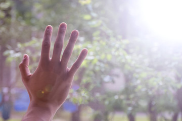 Male hand on the window