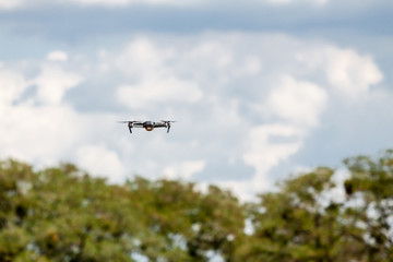 Fototapeta na wymiar Flying drone with blue sky