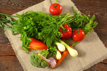 Fresh vegetables on a wooden table. Healthy food. Diet