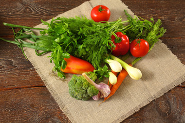 Fresh vegetables on a wooden table. Healthy food. Diet