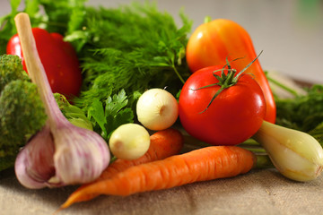 Fresh vegetables on a wooden table. Healthy food. Diet