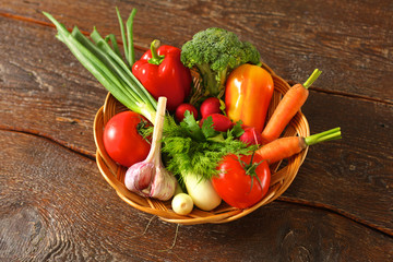 Fresh vegetables on a wooden table. Healthy food. Diet