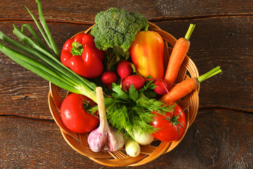 Fresh vegetables on a wooden table. Healthy food. Diet