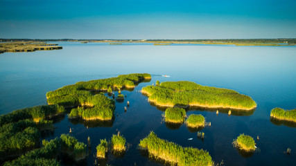 Naklejka na ściany i meble Aerial view Reeds island in the lake on Hungary, Sukoro, Velence.