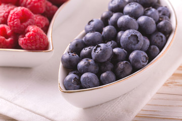 Raspberry and blueberry. Concept of healthy food. Top view