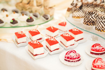 Different kinds of baked sweets on a buffet