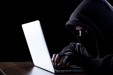Anonymous hacker in the dark
