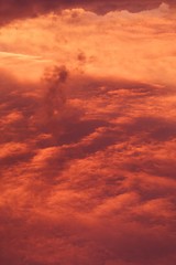red sunrise cloudscape, top view