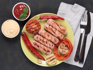 Grilled chicken sausages close up