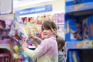 Two girlfriends   in   toy store