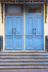 Double old blue door