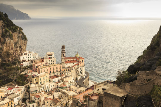 Atrani, elevated view of church, coast road and misty sea, Amalfi Coast, Campania
