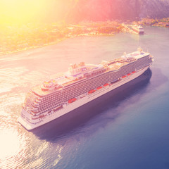 Top view of a large cruise ship in sunlight