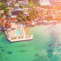 Top view of part of the old town by the sea in the sunlight