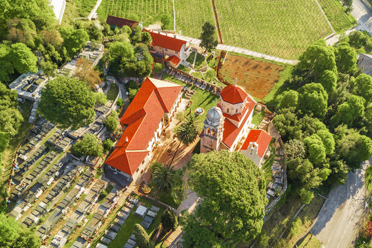 Top view of an ancient monastery with a cemetery
