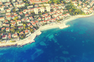 Naklejka premium View from height to seaside town. Toned