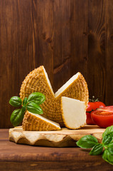 Round smoked cheese