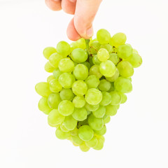 Bunch of green grapes on white background.