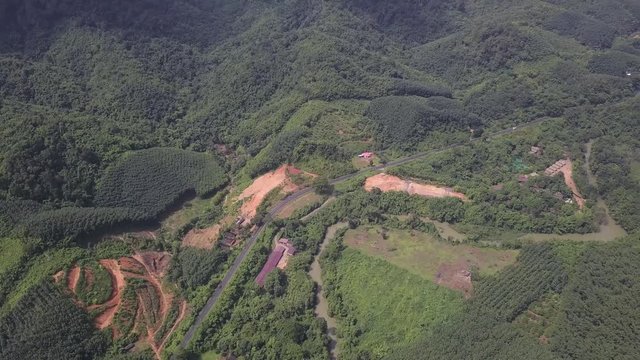 Tropical forest going to the distance, river, rocs