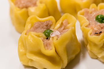Dumplings of dough stuffed with fish