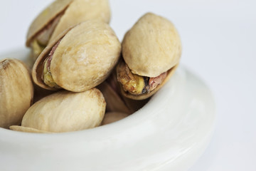 Pistachios on a bowl