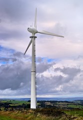 Fototapeta na wymiar Wind Turbine Generator on the Top of a Hill