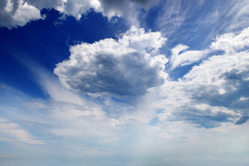 cumulus clouds in blue sky