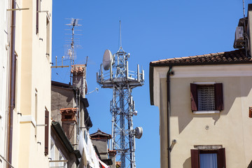 Fototapeta na wymiar Antenna in out of town, communication technology and business.