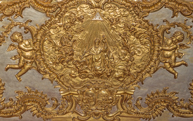 TURIN, ITALY - MARCH 14, 2017: The gold polychrome relief of Glory of St. Augustine in church...