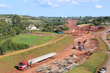 Truck hauling concrete bridge beams