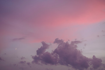 Majestic sunset in pastel tones. Sky and clouds at beautiful evening.