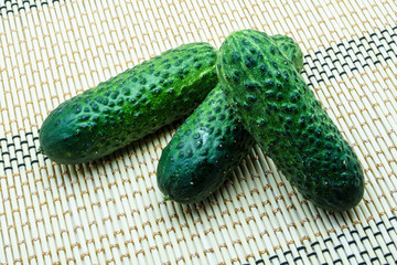 Fresh homemade green cucumber on a napkin