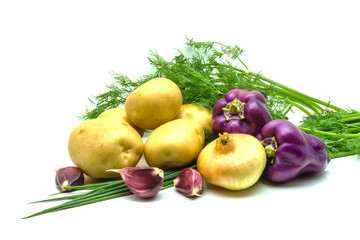 Assortment of fresh raw vegetables on white background. Selection includes potato, tomato, green onion, pepper, garlic and dill