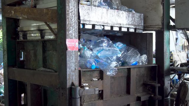 Pressing Garbage in Asia. Recycling Process