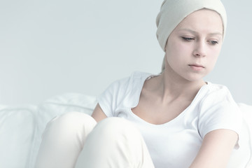 Girl with cancer looking away