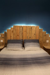 Rustic bed with modern led light made of pallets