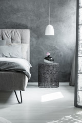 Interior with openwork bedside table