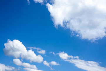 Beautiful blue sky with clouds. Nature Background. Outdoors on summer day.