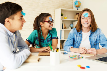 Children Playing Games in Classroom