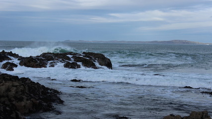 Water seeping over the rocks - coast