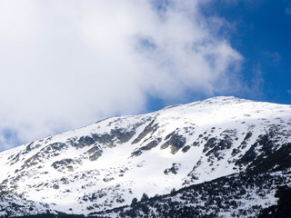 Mount Bezbog and cabin in Pirin Mountain, Bulgaria