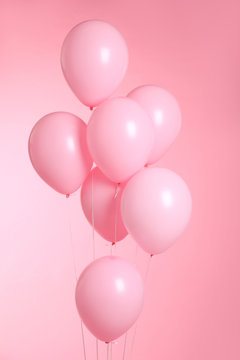 closeup of balloons isolated on pink background