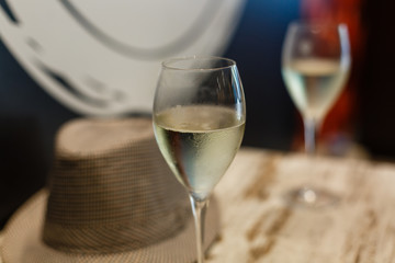 Two glasses of champagne on a buffet table