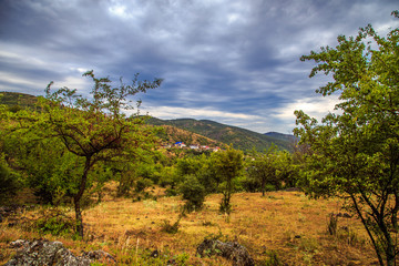 Obraz premium Small beautiful village among the mountains