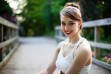 Travelling Girl on a Wooden Bridge in a White Dress