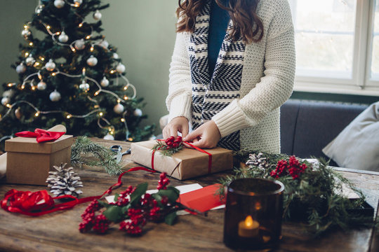 Woman Packs a Christmas Present