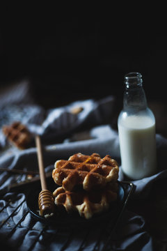 Waffles,honey and milk still life