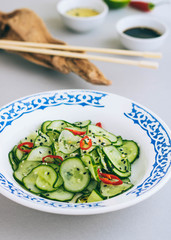Thai cucumber salad with sesame and chili, dressing for salad, Asian cuisine