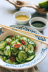 Thai cucumber salad with sesame and chili, dressing for salad, Asian cuisine